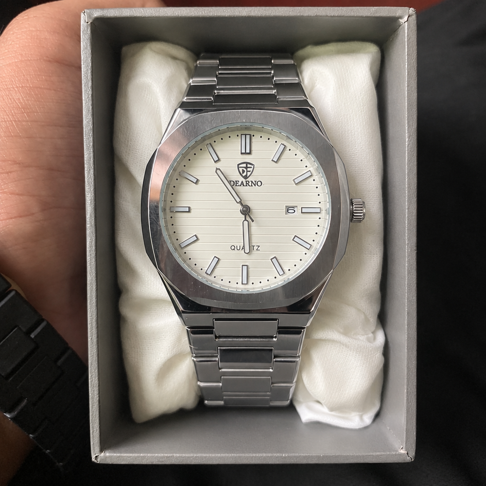 DEARNO silver watch with white dial, front view, in presentation box
