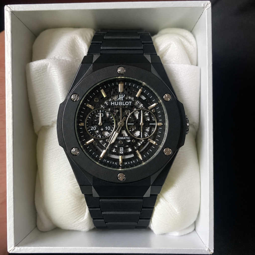 HUBLOT black skeleton watch with black case, front view, in presentation box