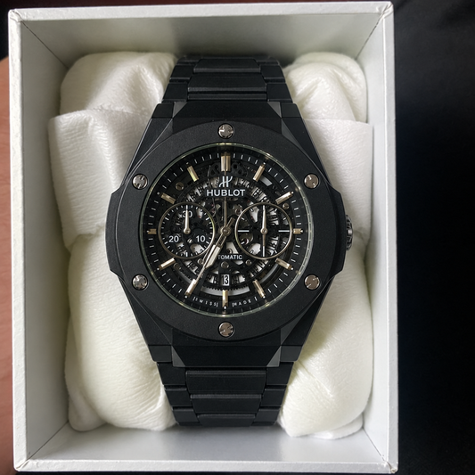 HUBLOT black skeleton watch with black case, front view, in presentation box